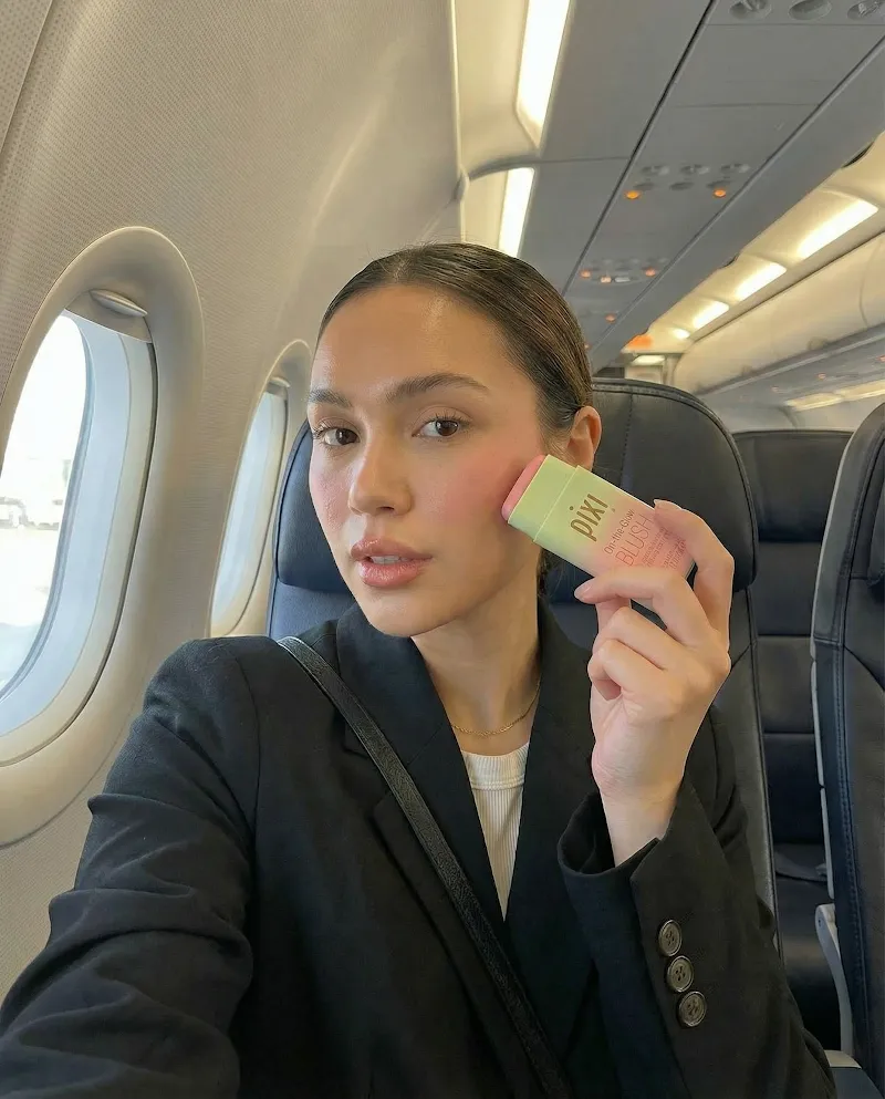 Airplane beauty product selfie image