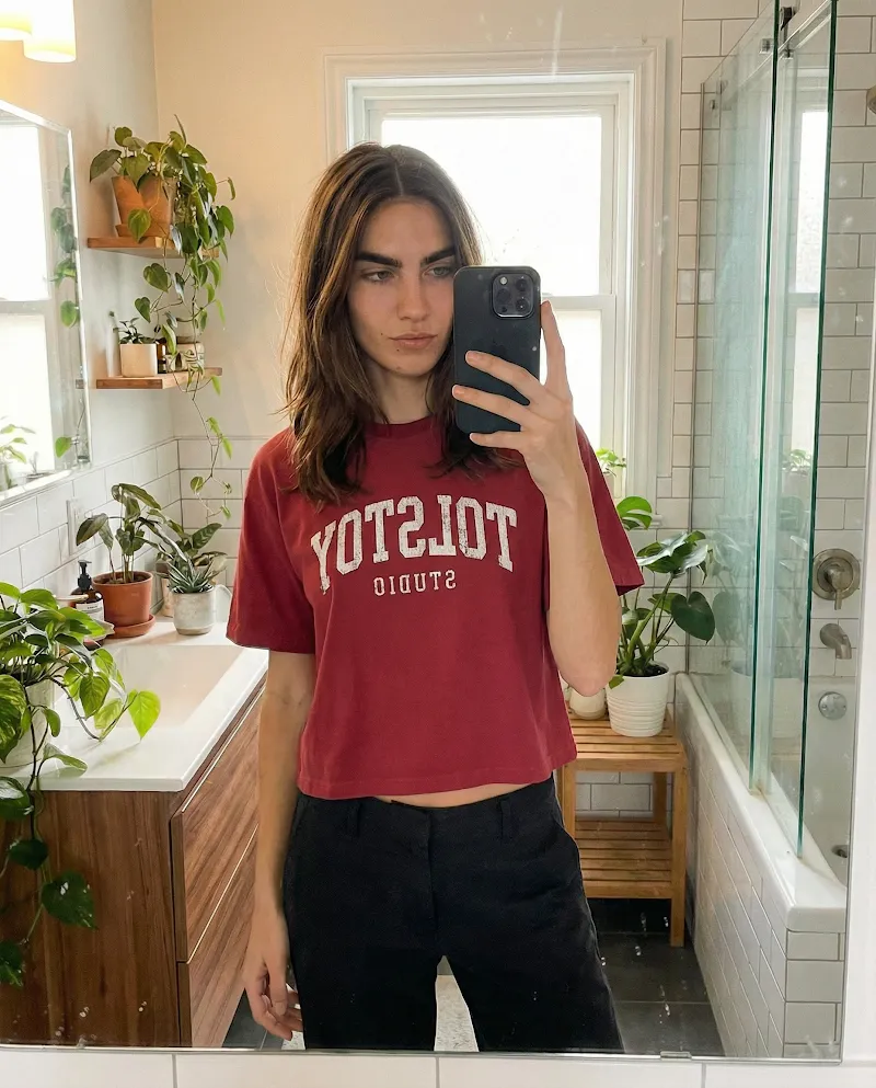 Bathroom graphic tee selfie image