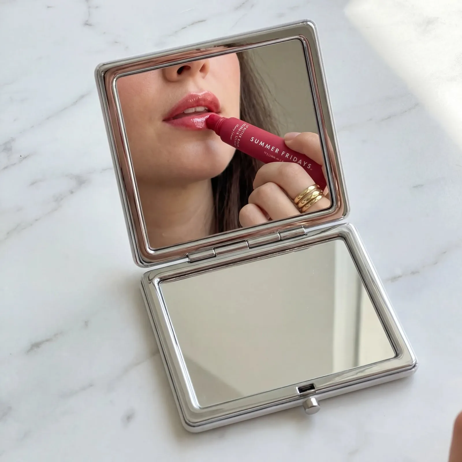 Compact mirror lip balm image