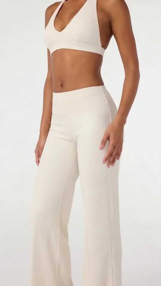 White athleisure set studio ad video
