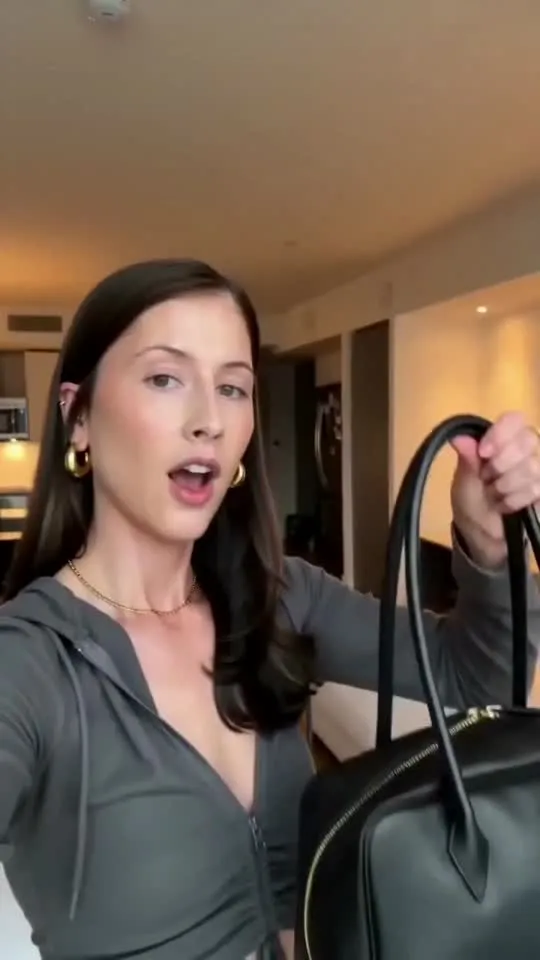 Black handbag mirror ad video