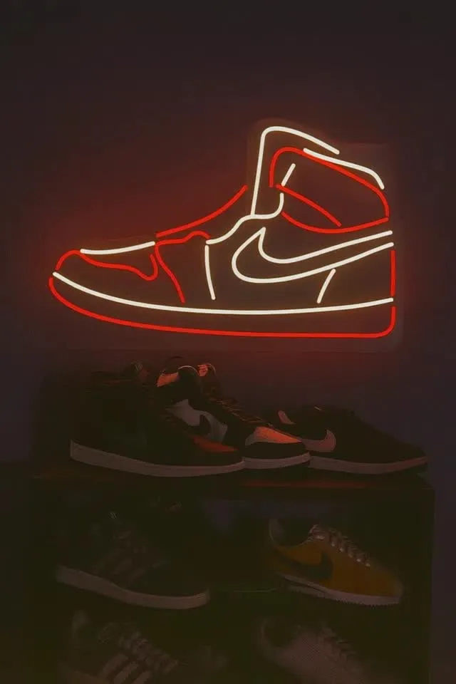 Neon sneaker shelf ad video