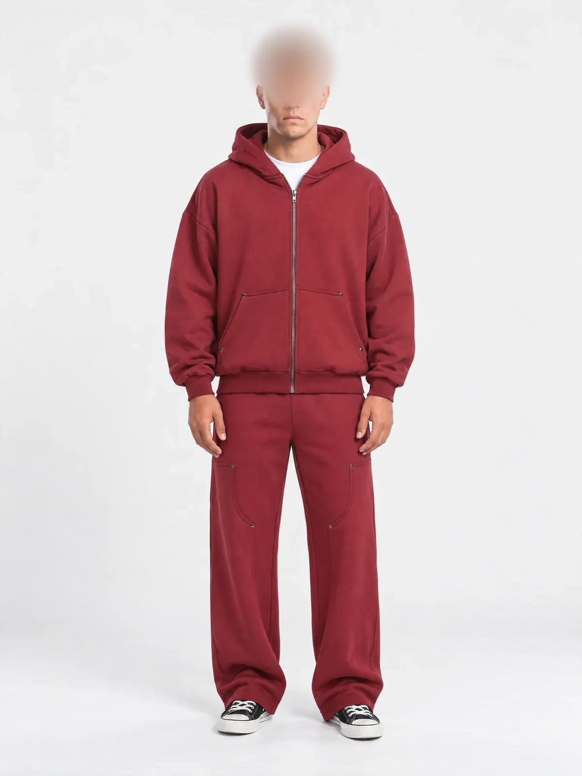 Tolstoy draft of a house-brand hoodie, front view; the model’s face is blurred