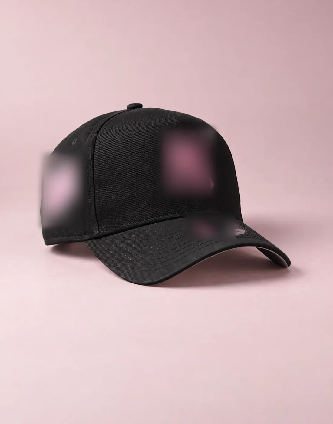 Licensed-cap homepage creative draft: a black cap on a blush-pink background, logos blurred