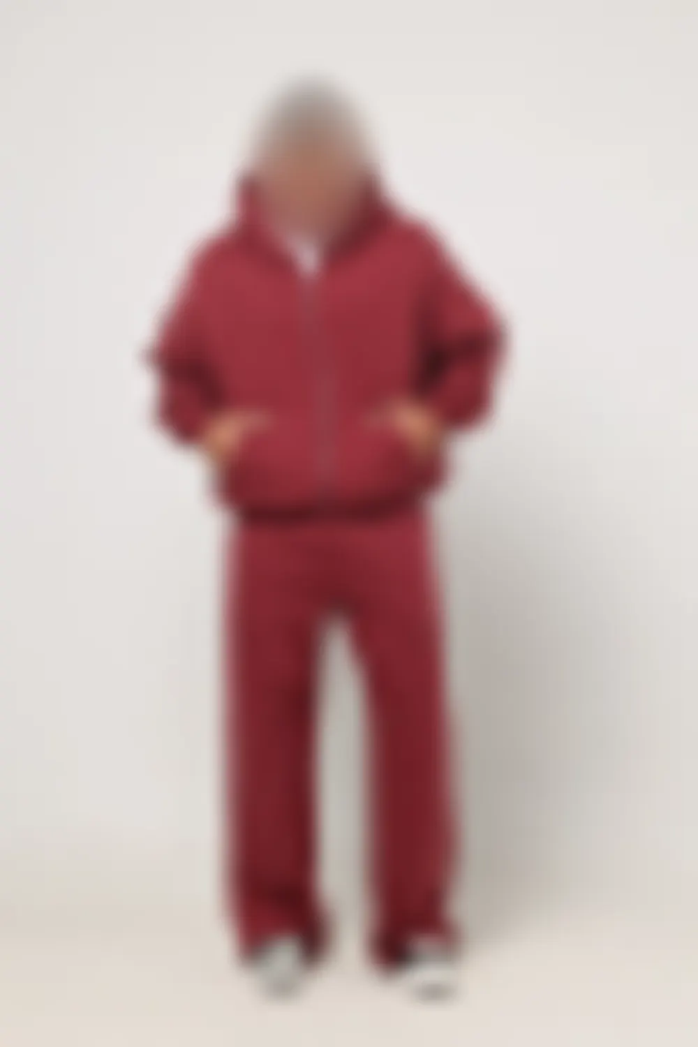 Original reference photo of the house-brand hoodie for the manual test, blurred to protect the client