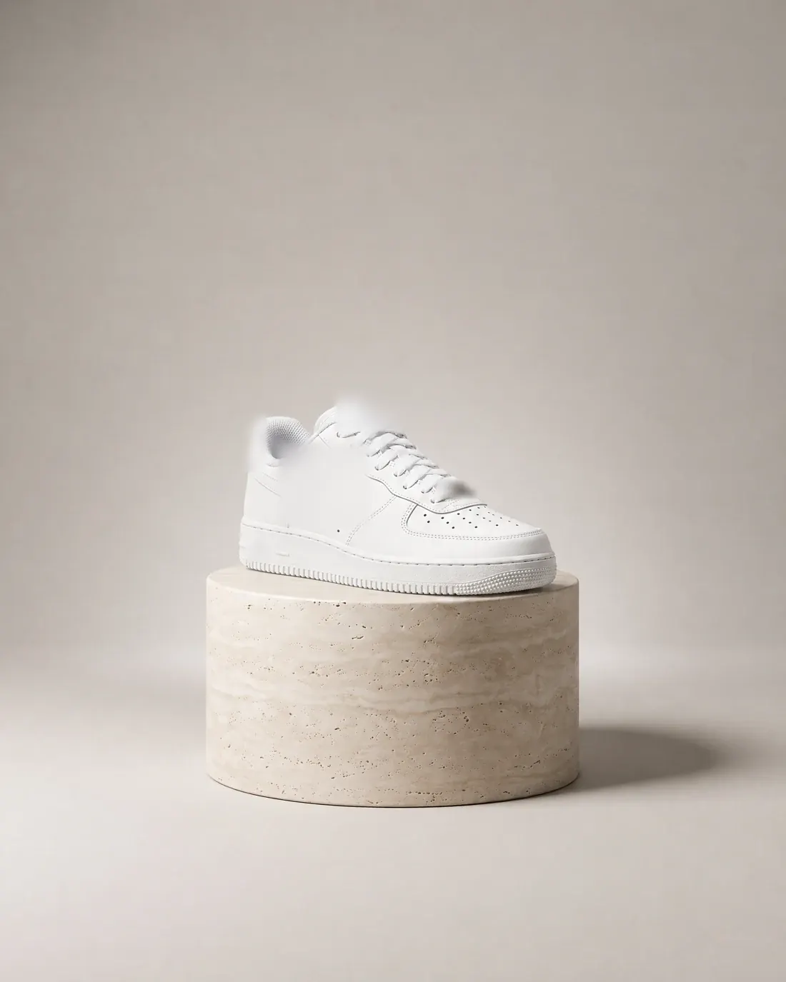 Still frame from the proposed sneaker animation, which cycles through five shoe styles on the same light studio background; logos blurred