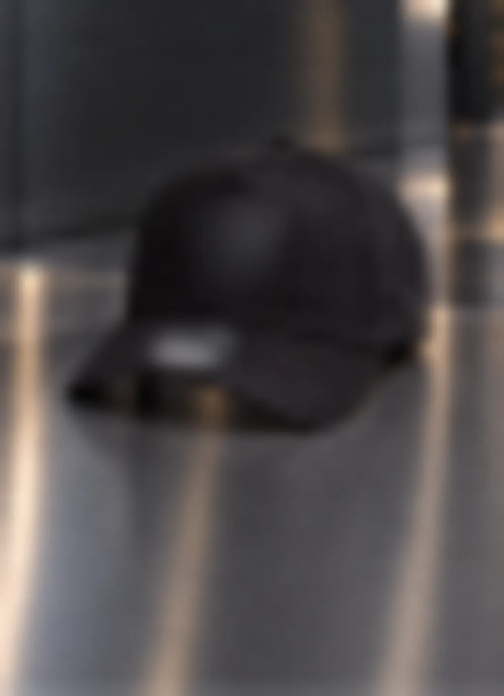 Original Headwear homepage creative featuring a licensed cap, blurred to protect the client